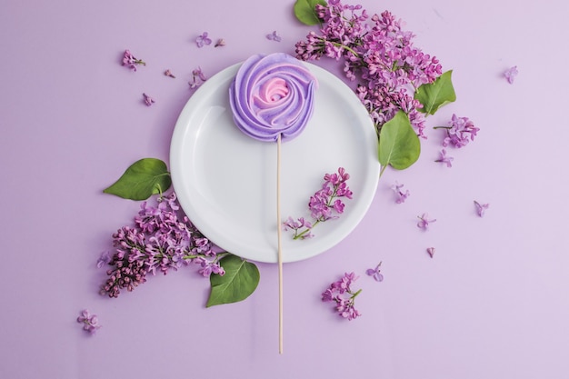 rustic table setting with lilac flowers on light table