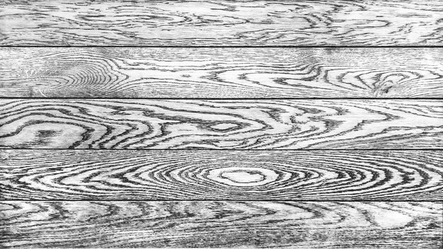 Rustic wood top with a pronounced oak grain in horizontal slats for a wide backdrop.