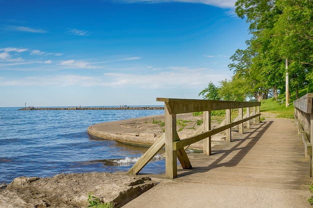 Rustic wooden bridge and lake Ontario