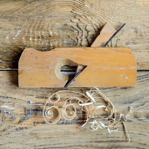 Rustic woodworking tools on old wooden table Top view copy space