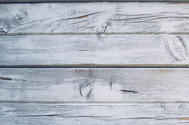 Rustieke doorstane blauwe en witte grunge rustieke houten panelen. Houten verouderde texturen planken stock fotografie