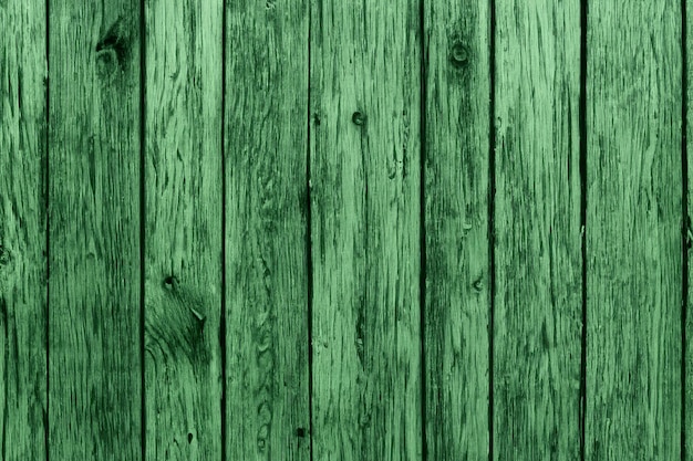 Rustieke oude donkergroene getextureerde grunge houten hekwerk planken achtergrond