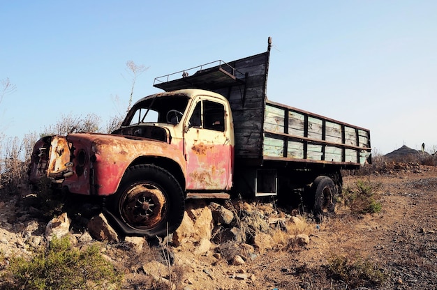 rusty abandoned truck on the desert, in canary islands, spain