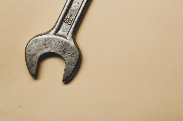 A rusty auto wrench on white background