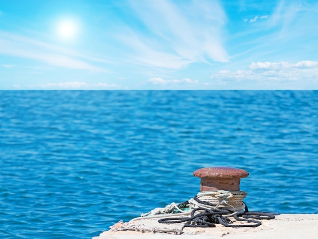 Rusty bollard on a sunny day