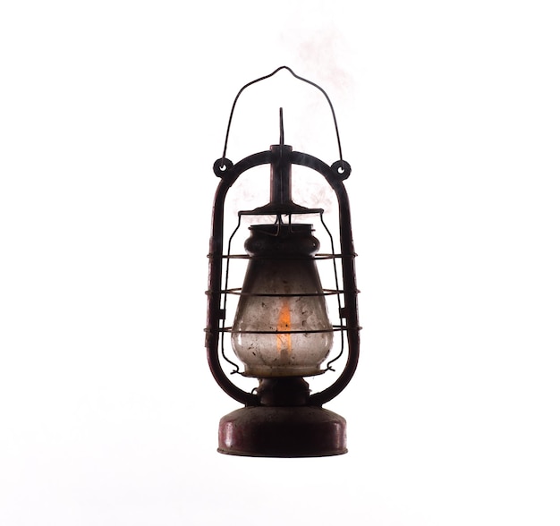 rusty dirty kerosene lamp isolated on white background