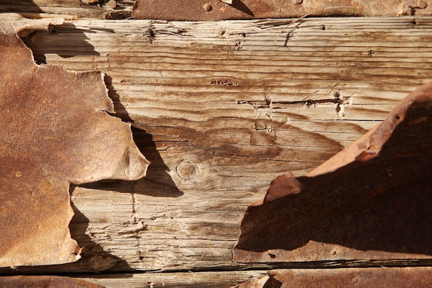 rusty metal on old wooden door