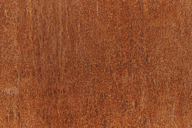 Rusty metal plate background texture. Steel plate with rust covered almost full sheet.