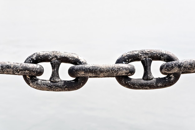 Photo rusty steel chain, on white background. links.