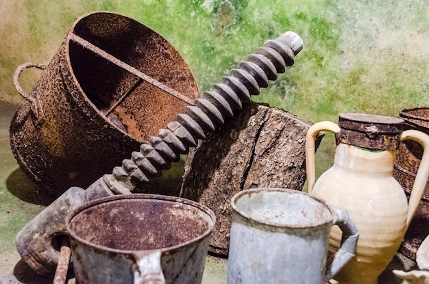 Rusty tools in an ancient underground oil mill in Salento Italy