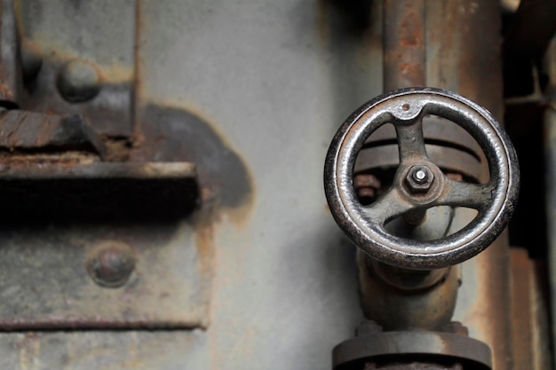 Rusty valve in abandoned steel factory