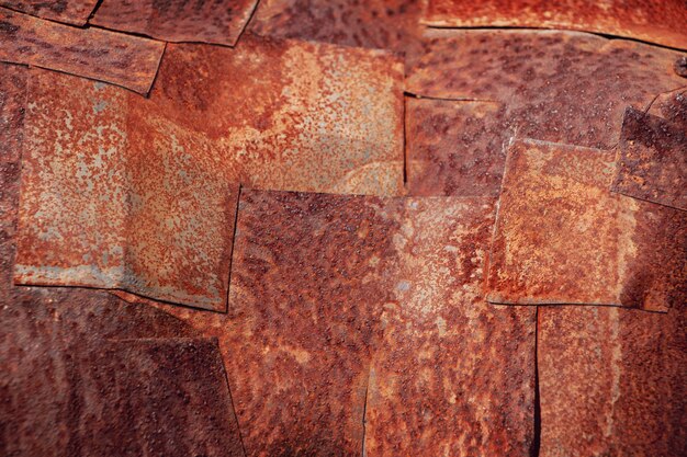 Rusty weathered metal patches. abstract industrial background