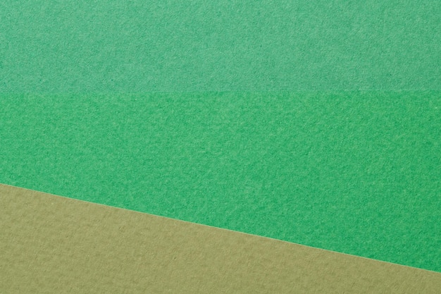 Ruwe kraftpapier achtergrond papier textuur verschillende tinten groen Mockup met kopieerruimte voor tekst