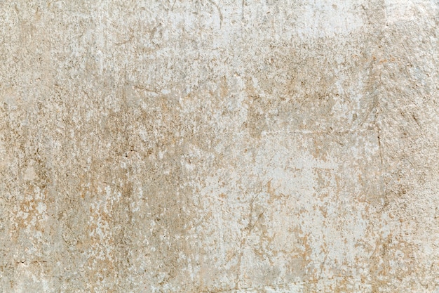 Ruwe oude grijze betonnen muur