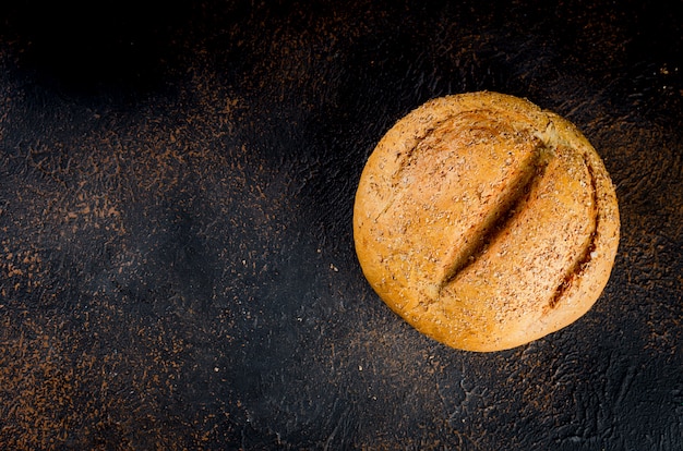 Rye bread on dark table