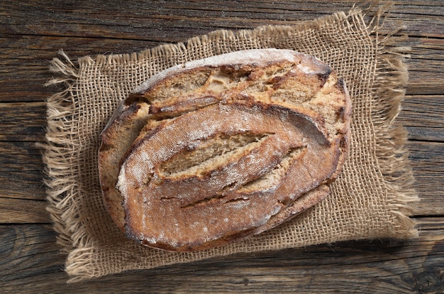 Rye bread loaf on a wooden table