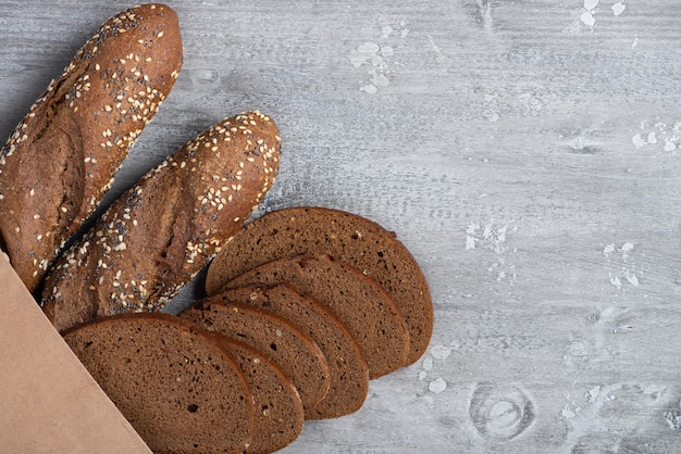 Rye bread in a paper bag on the table