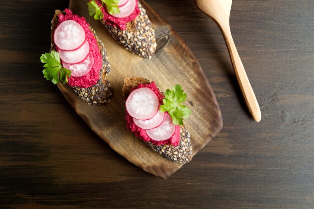 Rye bread with butter and radish. Healthy food.