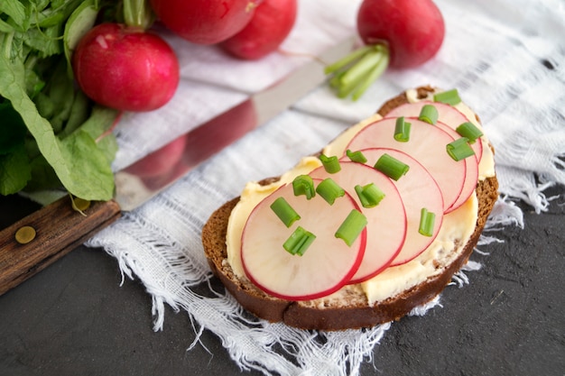 Rye bread with butter and radish. Healthy food.