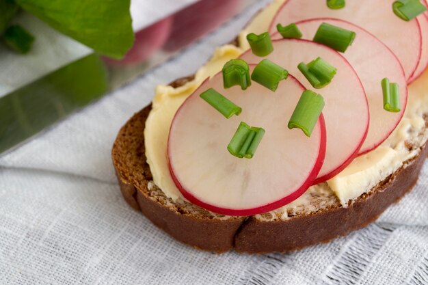 Rye bread with butter and radish. Healthy food.