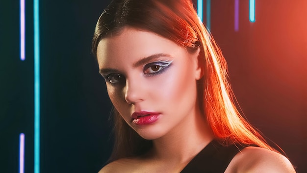 S beauty artistic makeup s fashion look red blue color neon light closeup portrait of teen girl