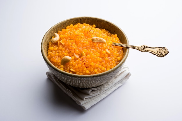 Sabudana or Sago Kesari dessert for Vrat Upvas also known as Sweetened Tapioca Pearl. served in a bowl. selective focus