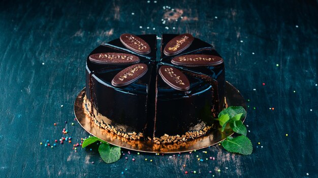 Sacher Chocolate Cake On a wooden background Top view Copy space