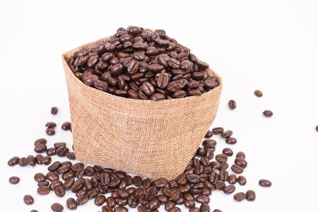 Sack of coffee beans on white