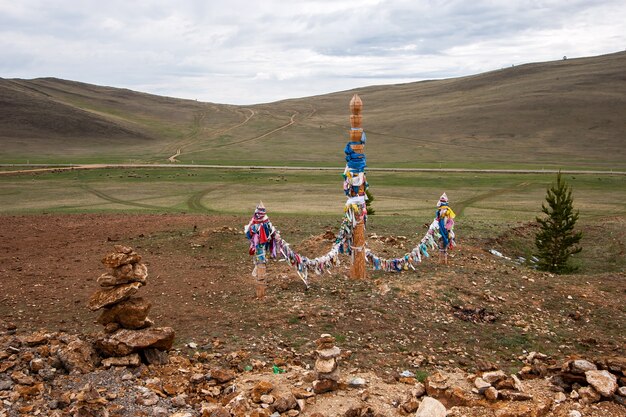 Sacred pillars with ribbons for shamanistic rites