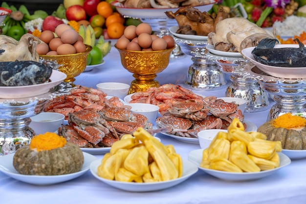 Sacrificial offering food for pray to god and memorial to ancestor Bangkok Thailand Traditional offerings to gods with food vegetable and fruit for the gods of Thai culture