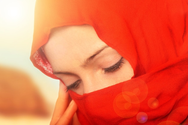 Premium Photo | A sad arabic woman standing in the sun