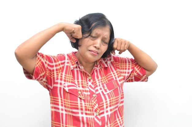 sad asian senior woman with hand gesture of crying