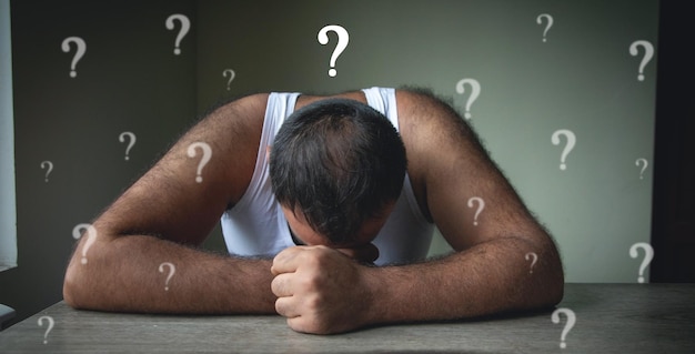 sad caucasian man with a question marks