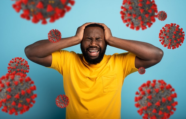 Sad and desperate expression of a boy who is scared to catch the coronavirus