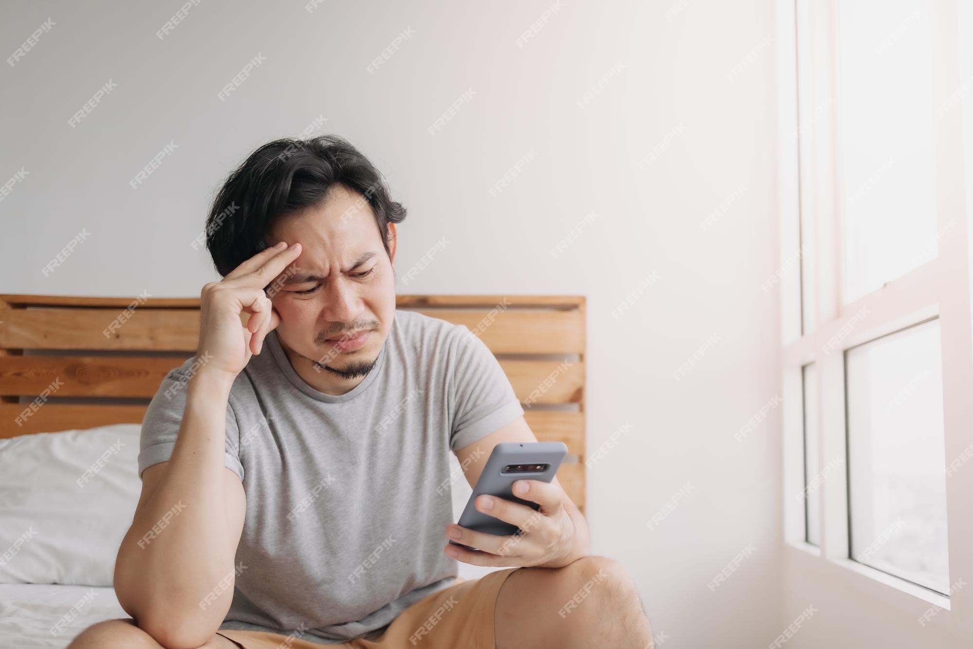 Sad Man Has Bad Online Chat News and Feels Disappointed on the Smartphone.  Stock Photo - Image of disappointment, frustration: 230679098