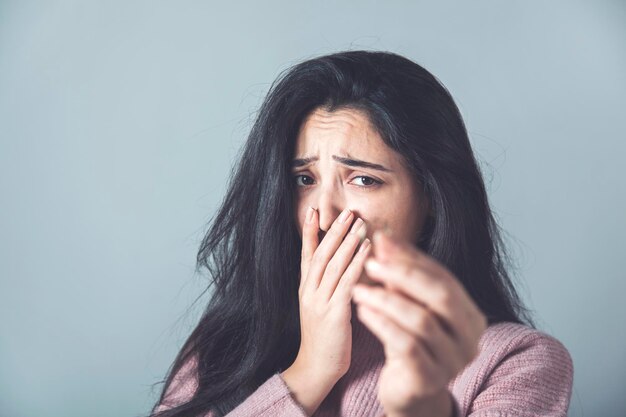 Sad woman hand ring