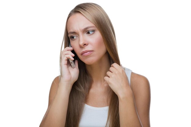 Sad woman talking on phone