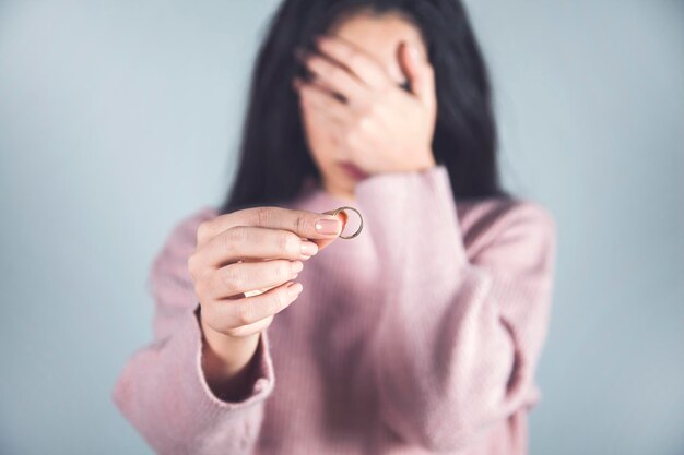 Sad woman with ring