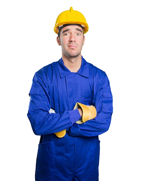 Photo sad workman on white background