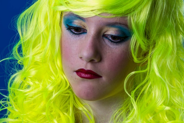 Sad, young girl with yellow hair