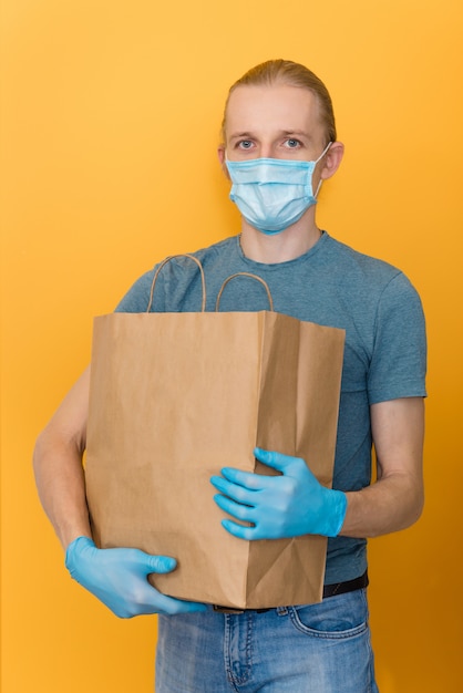 Safe grocery delivery, man courier, coronavirus quarantine