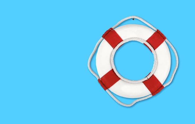 Photo safe life buoy on blue background