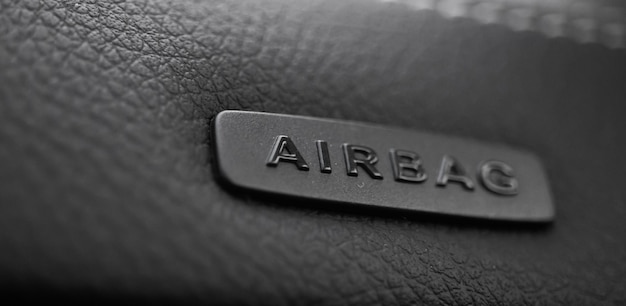 Safety airbag sign on car luxury sport car interior background photo