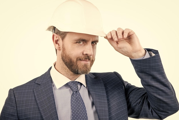 Safety business successful man with greeting gesture entrepreneur in protective helmet