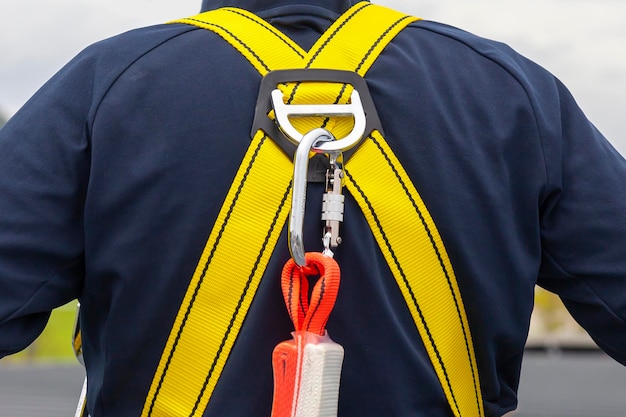 Photo safety clothing for working on a technicians building