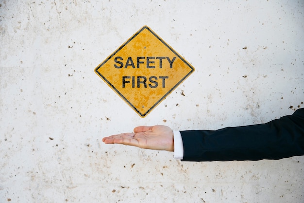 Photo safety first concept with hand