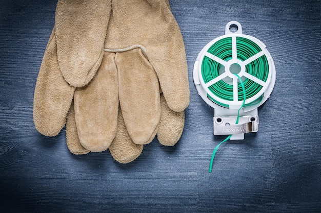 Safety glove and rolled garden wire