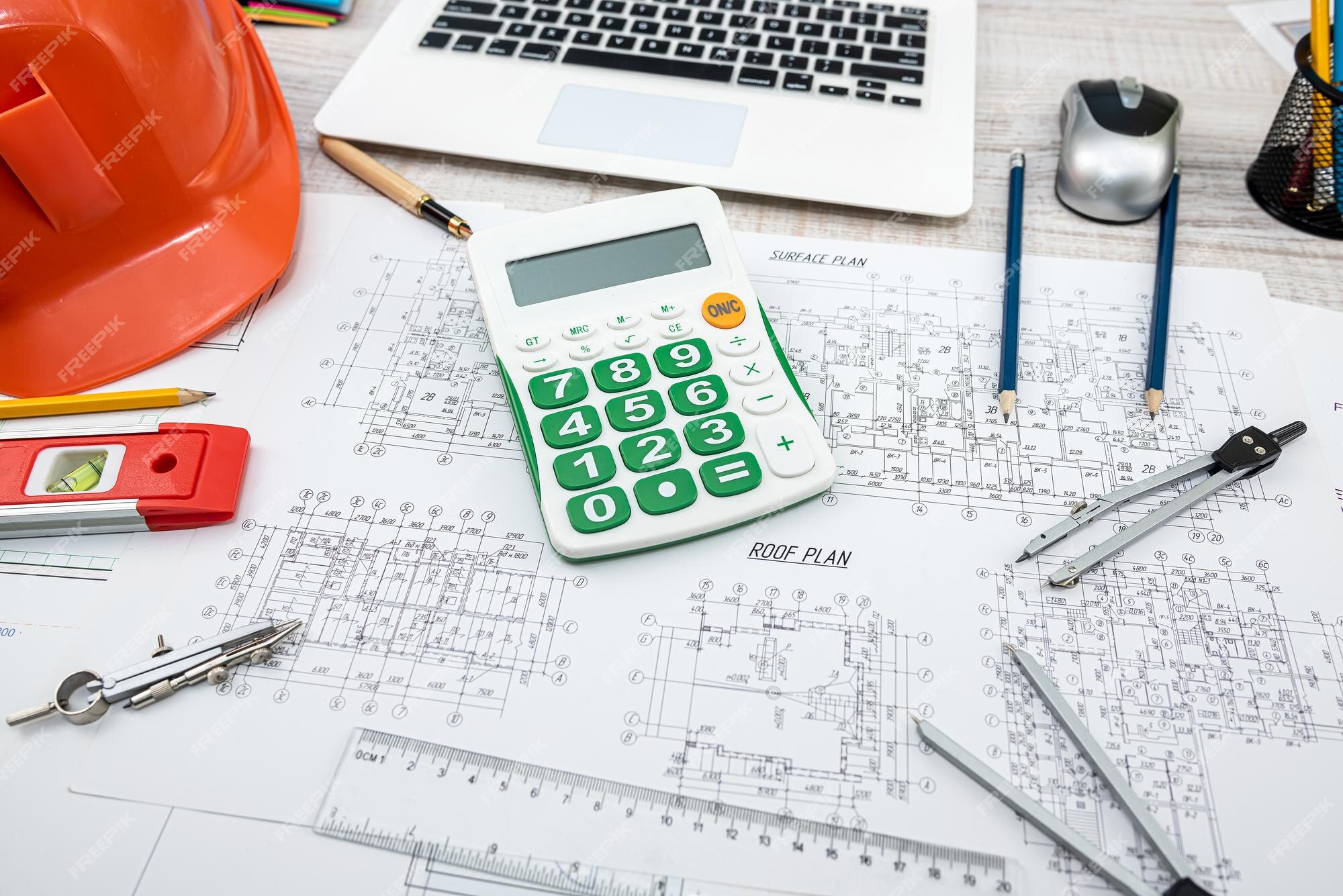 Premium Photo | Safety helmet wort tools on house drawing of blueprint