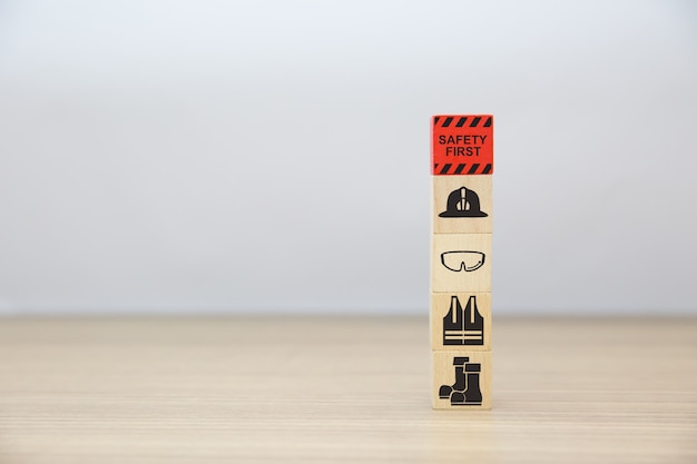 Safety icons on wooden toy Blocks stacked.