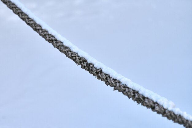 Sail rope hanging from fishing ship or yacht, close up